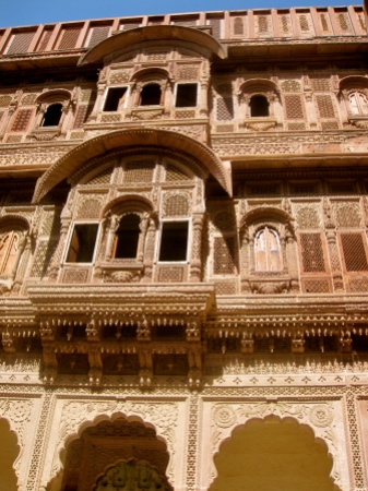 Palaces within the fort. The women watched the world behind stone screens, carved to look like lace