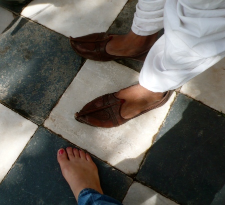 Got to have FEET in a photo!  (for Jack!)  The curly cue Rajasthani shoes of a man next to my bare feet before entering the Jaswant Thada (must remove shoes before entering the mausoleum)