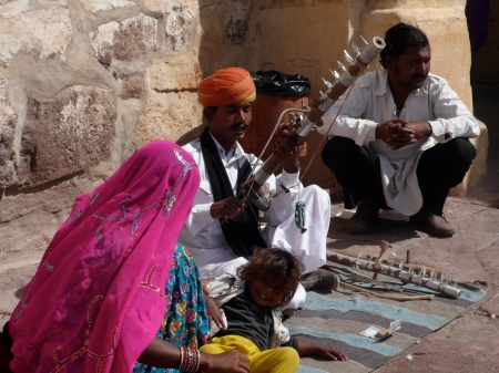 Musician and his family just inside of the fort. 