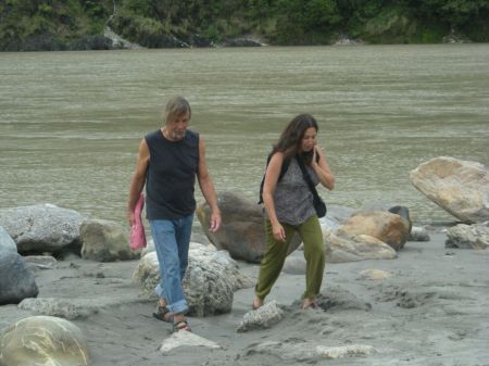 Don and Fran wading in the fast flowing Ganga (Rishikesh)