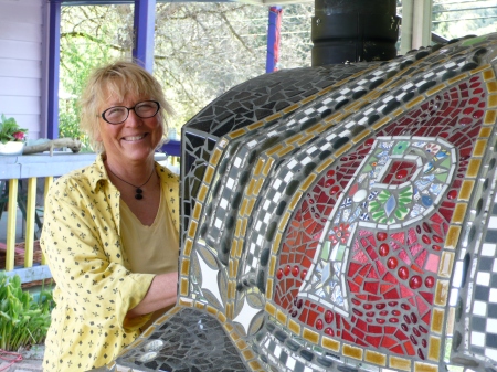 Karen Biondo with her beautiful pizza oven!  She and Leslie make and sell pizza at the Vashon Farmers' Market