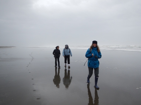 Walking on reflective sand, Ocean Shores, WA